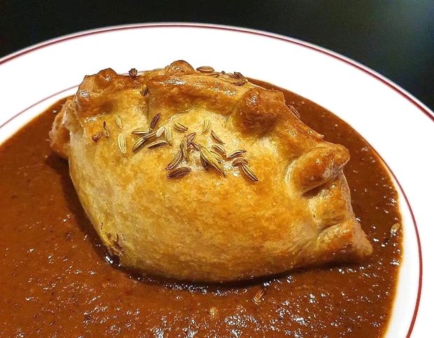 This oxtail madras pasty occupies the culinary Higher Ground