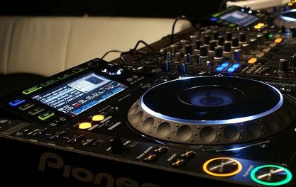 Manchester Restaurant and Bar Owners Battle over Turntables for Charity