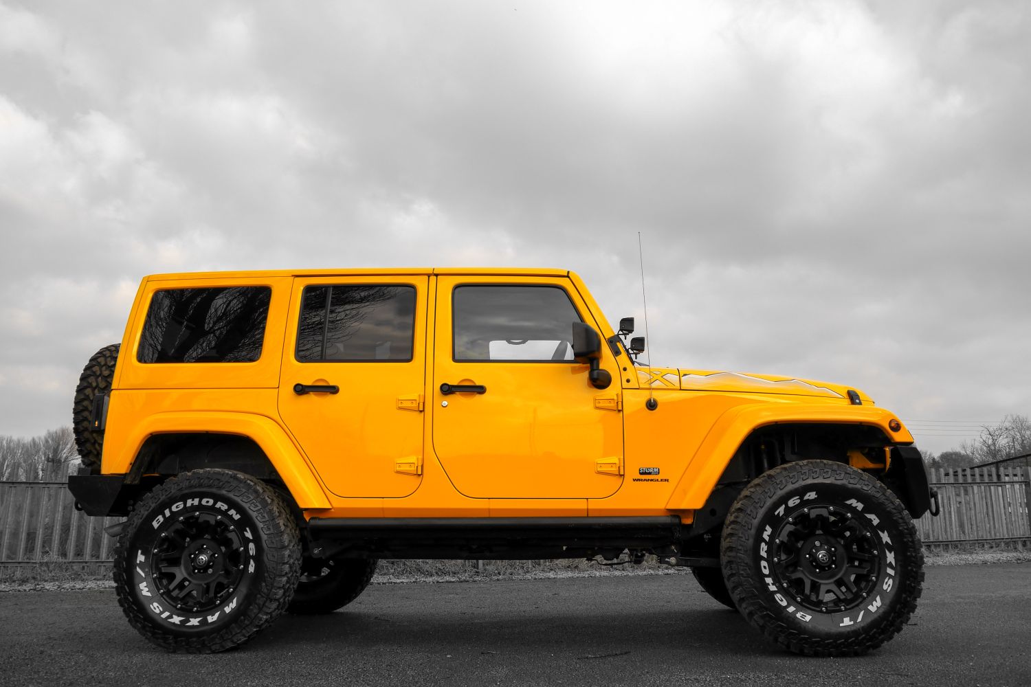 STORM-52, 2015 Baja Yellow Jeep Wrangler X-Edition 4 Door  CRD |  Showcase | Storm Jeeps
