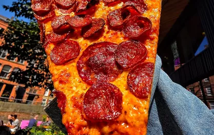 FREE SLICES: Nell's Pizza to give away free pizza to mark Freight Island opening next week