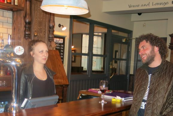 Jonny Booth and landlady Stephanie Price in the main bar of the pub