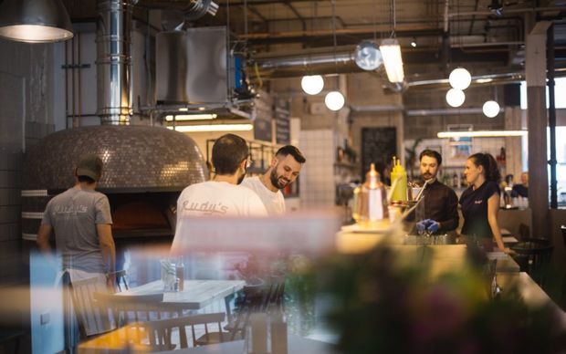 Grab a pizza the action at new Rudy's on Peter Street
