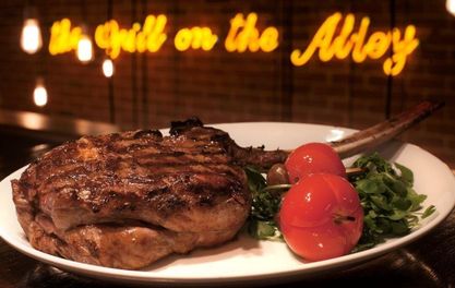 Win Dinner for two and a Bottle of wine at The Grill on the Alley 