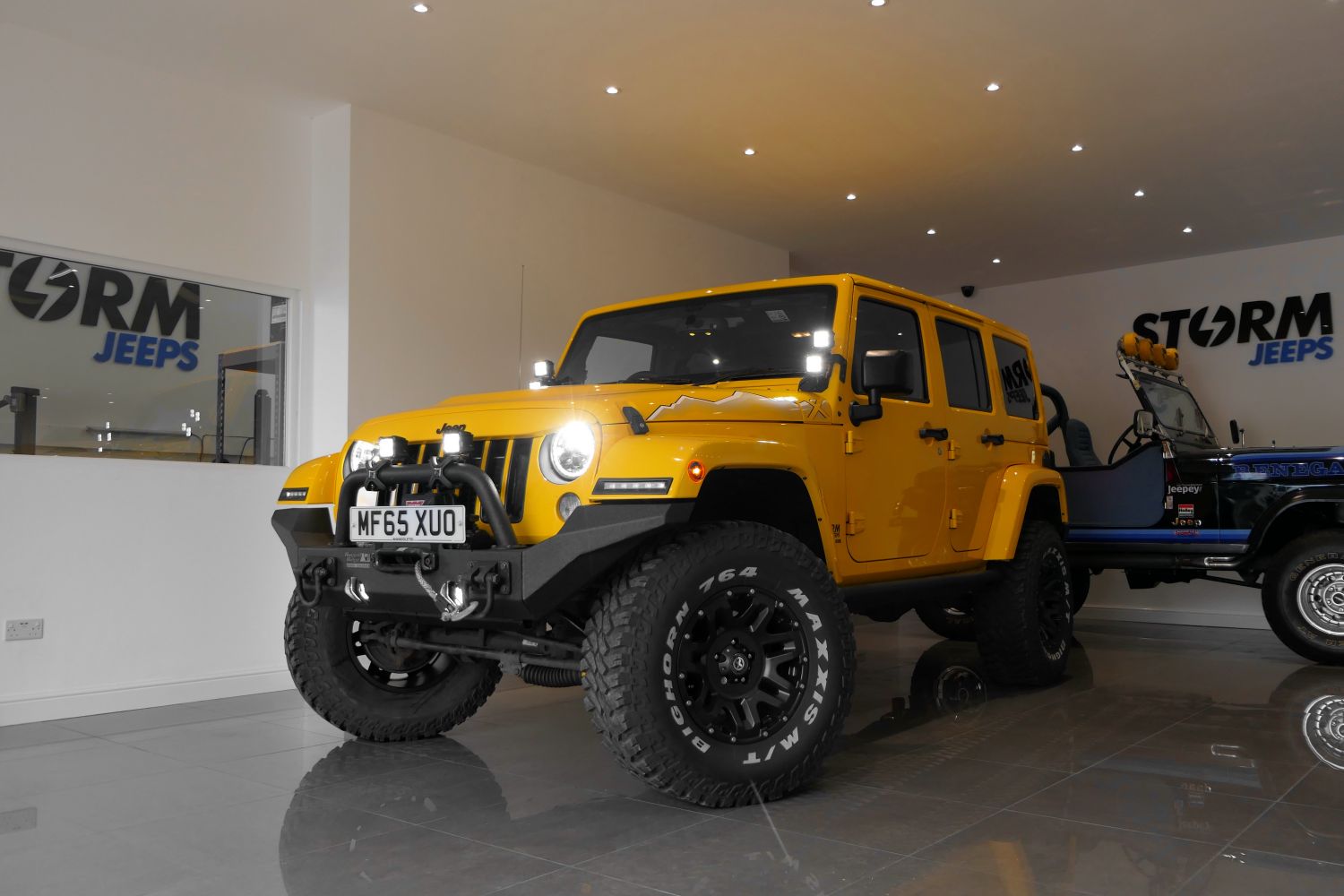 STORM-52, 2015 Baja Yellow Jeep Wrangler X-Edition 4 Door  CRD |  Showcase | Storm Jeeps
