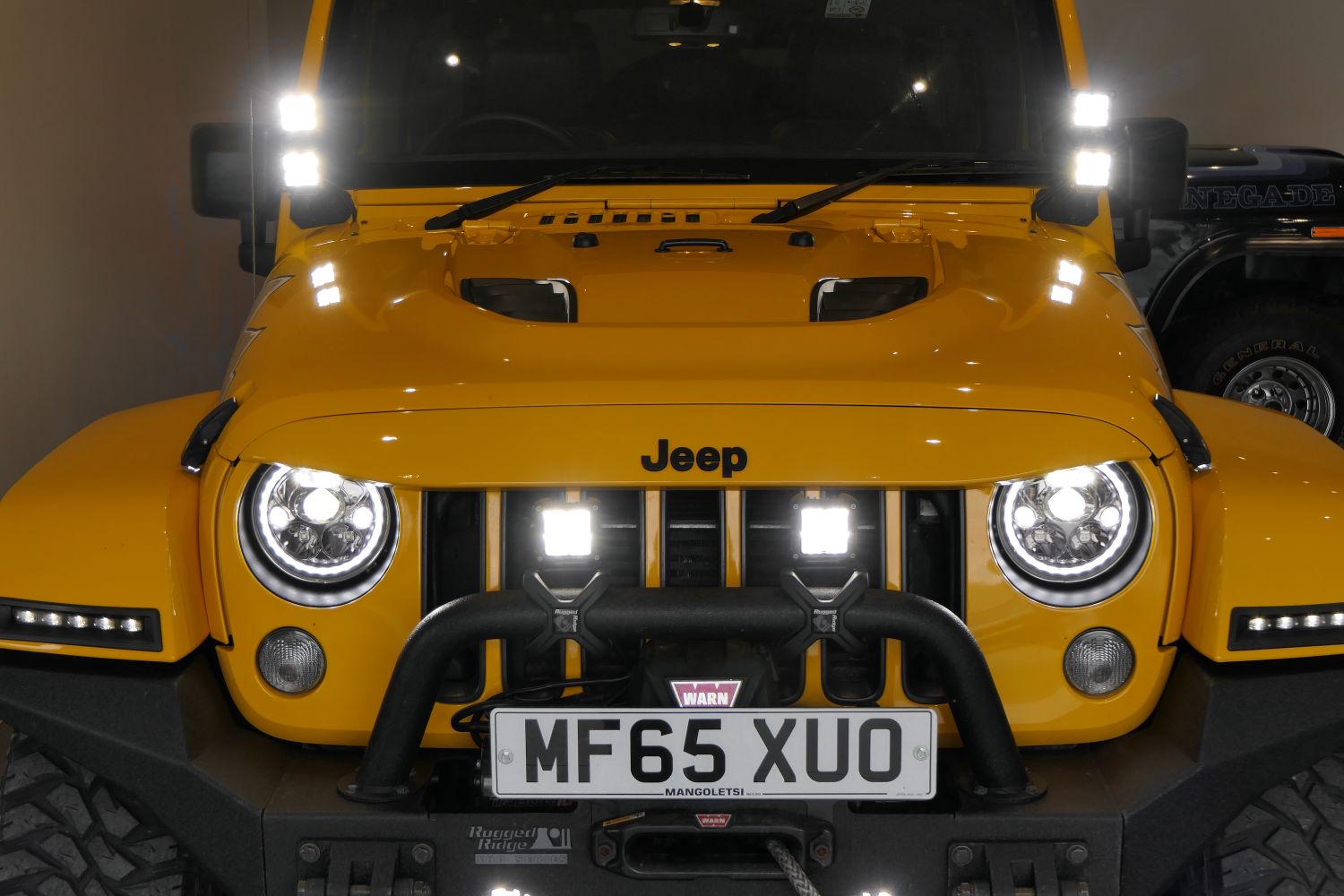 STORM-52, 2015 Baja Yellow Jeep Wrangler X-Edition 4 Door  CRD |  Showcase | Storm Jeeps