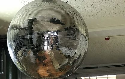 Randall & Aubin Manchester and the mystery of the misfit mirror ball