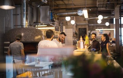 Grab a pizza the action at new Rudy's on Peter Street